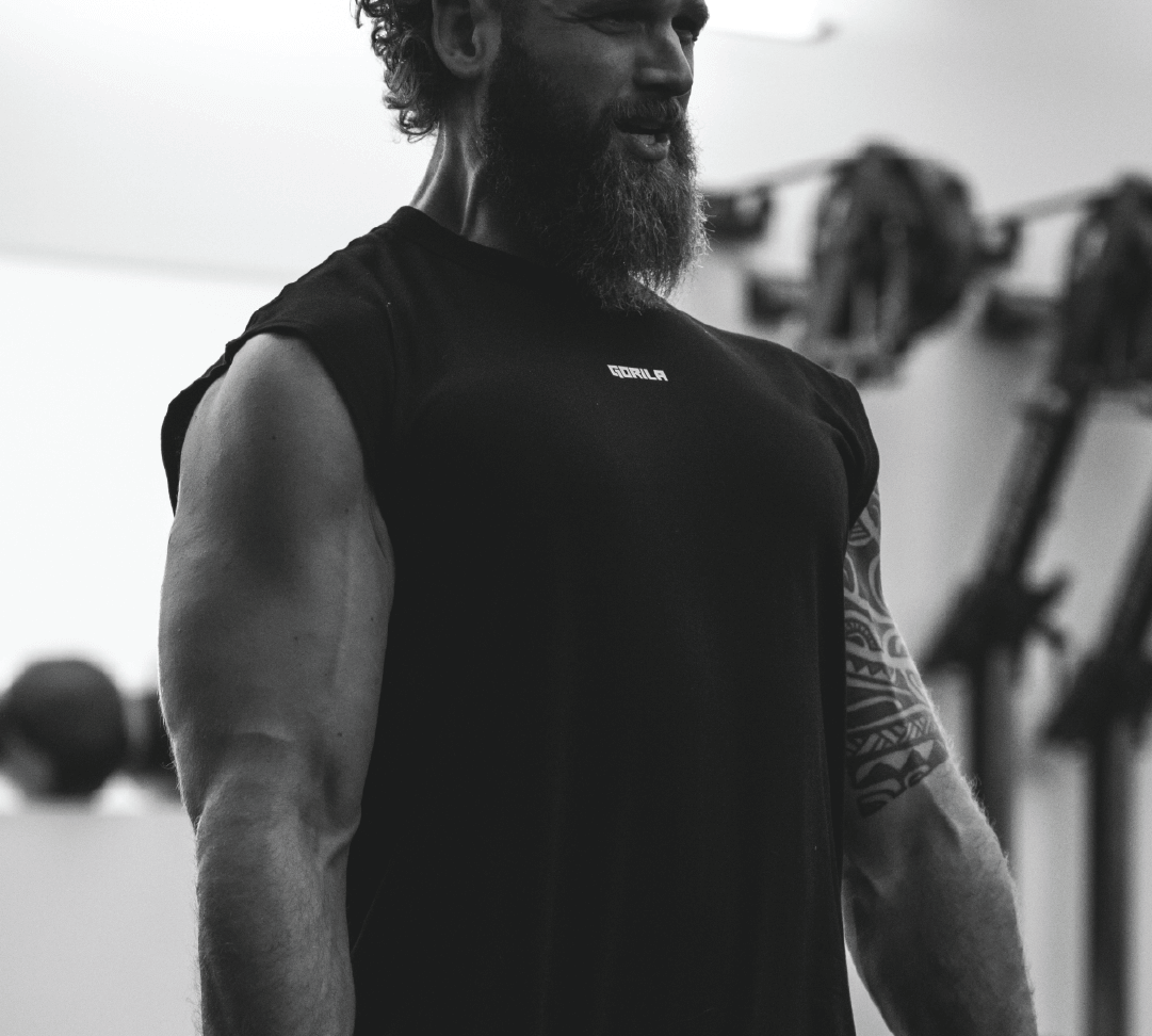 Athlete performing a heavy deadlift during a functional fitness session, showcasing strength and control — ideal for WLD Today's conditioning and finisher.
