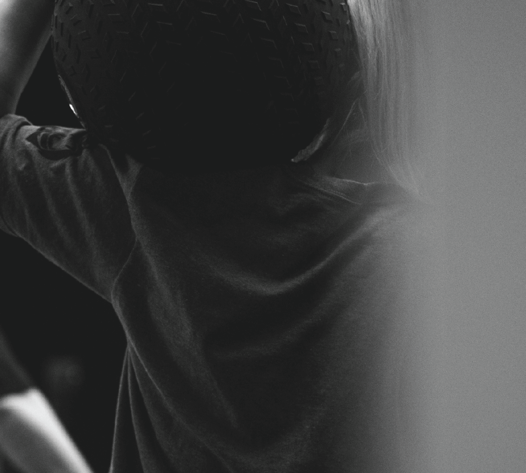 Athlete performing a WLD Walk — a weighted vest endurance session focused on steady-state movement, heart rate control, and mental clarity.