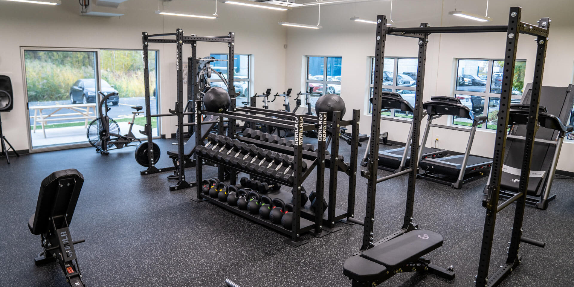 Black Power Racks and Storage for Gym Equipment in Commercial Gym Layout