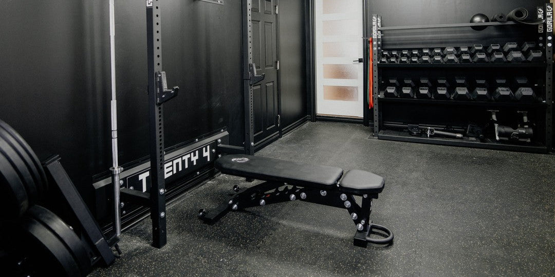 Black Home Gym on a Budget with Wall Mounted Squat Rack, Barbell, Plates and Dumbbells