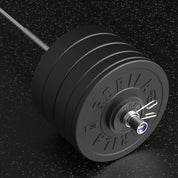 Close-up of Gorila barbell loaded with Ox bumper plates – 380 lb Elite strength training package for garage gyms in Canada
