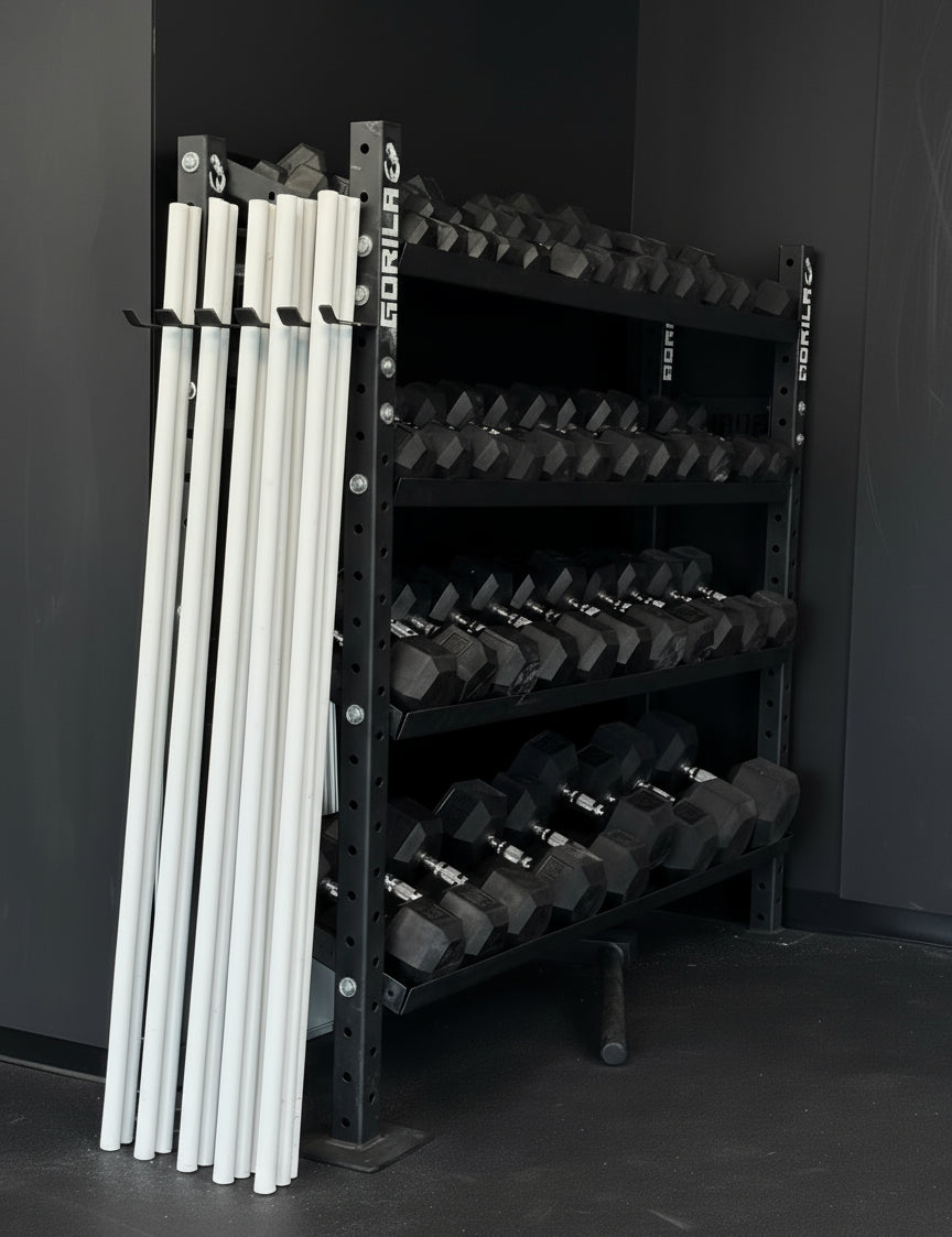 Heavy-duty Gorila Fitness storage rack loaded with dumbbells and PVC pipesin a modern black on black gym setting