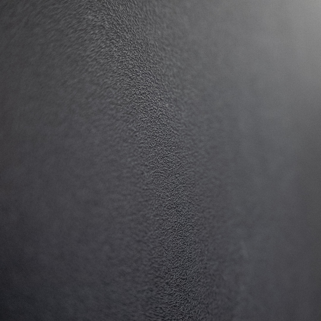 Close-up of Gorila Wall Guard's textured surface offering smooth glide over plywood.