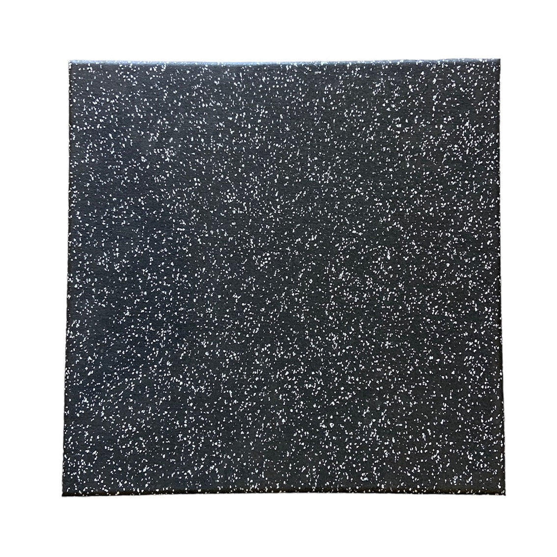 Close-up of Regupol gym flooring tile edge showing dense rubber construction and speckled finish, providing durability and non-slip performance for high-traffic gyms.
