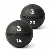 Pair of Gorila Medicine Balls, 14lb and 20lb, black textured finish with white Gorila Fitness logo, built for functional training.