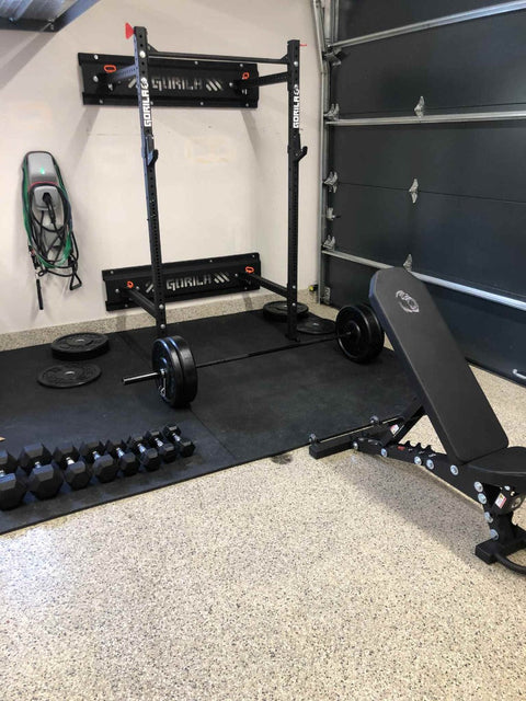 Garage gym in Canada with squat rack and pull-up bar