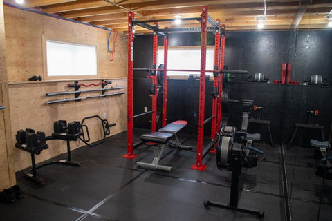 Garage gym setup with squat rack in a US home