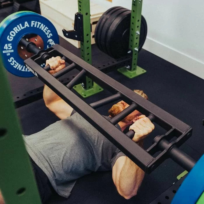 Gorila Alligator Football Bar loaded with bumper plates – heavy-duty matte black powder-coated steel multi-grip bar for strength training and CrossFit athletes