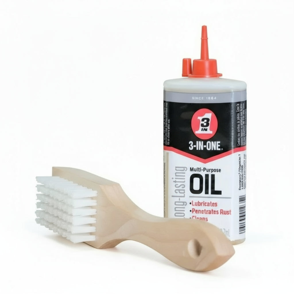 Gorila Barbell Maintenance Kit – includes nylon bristle brush and 3-in-1 oil to clean, lubricate, and protect barbell knurling and steel surfaces.