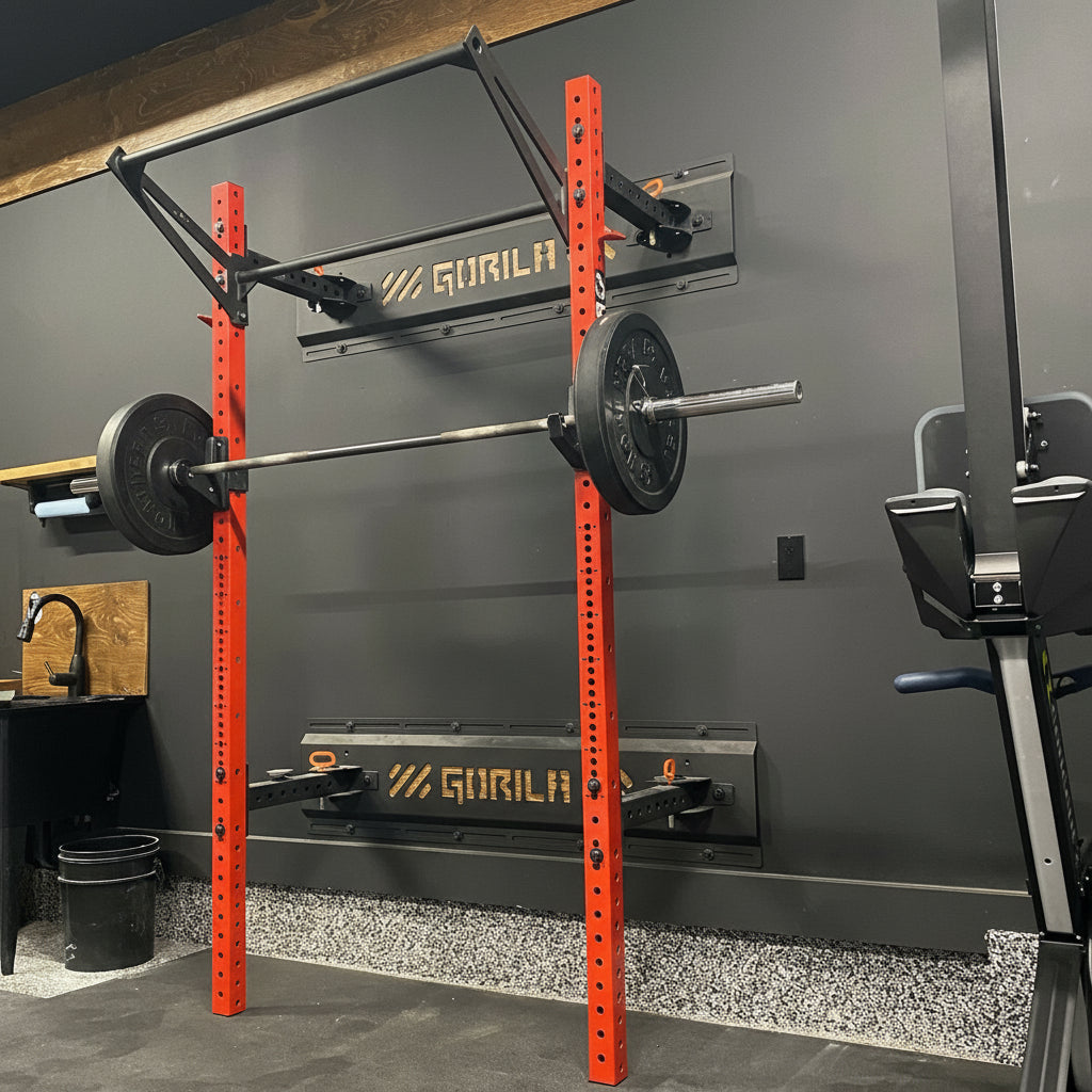 The Made in Canada Gorila Camo Rack custom color option in red finish in a black garage gym setup, with extensible pull-up bar