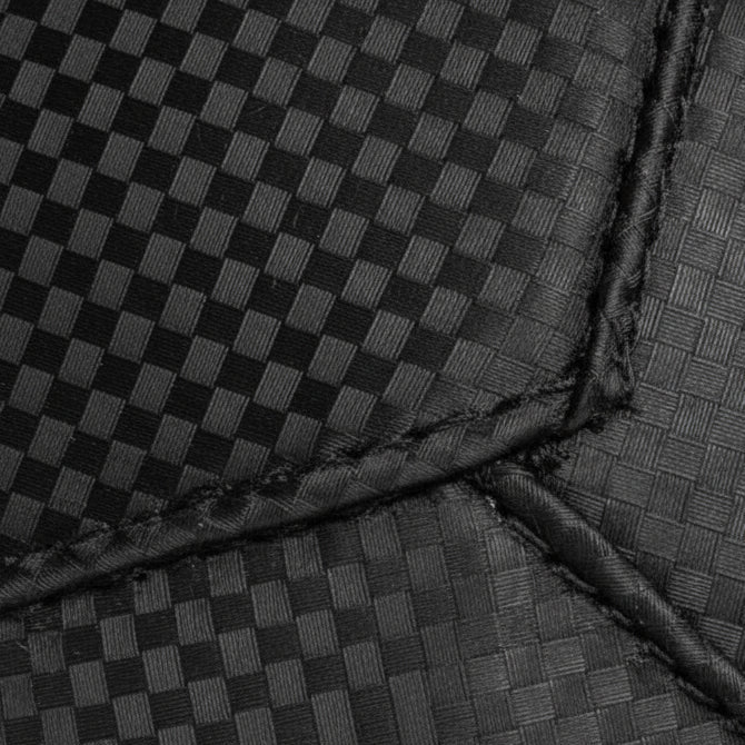 Close-up of Gorila Fitness carbon-textured PVC material, featuring a grippy checker pattern for enhanced durability and control.