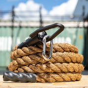 Natural Manila training rope for rope climbs and Military workouts inside a functional fitness gym.