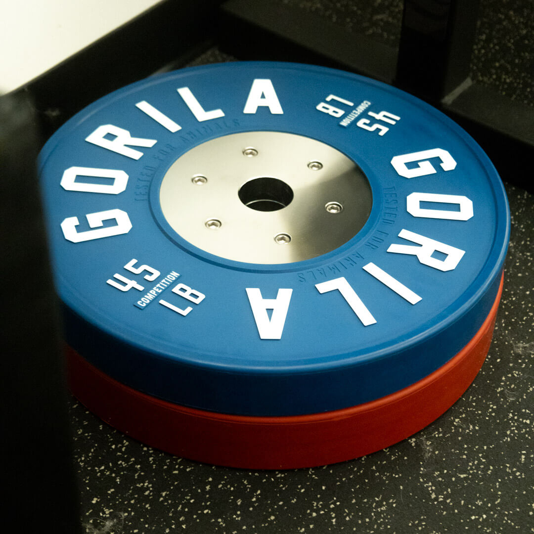 Stack of Gorila LB Competition Plates in red, blue, yellow, and green colors