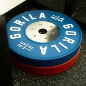 Stack of Gorila LB Competition Plates in red, blue, yellow, and green colors
