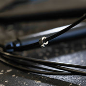 Close-up of the Gorila CSR2 Speed Rope screw and cable attachment system, showing precision threading and secure fit for adjustable, high-speed skipping performance.