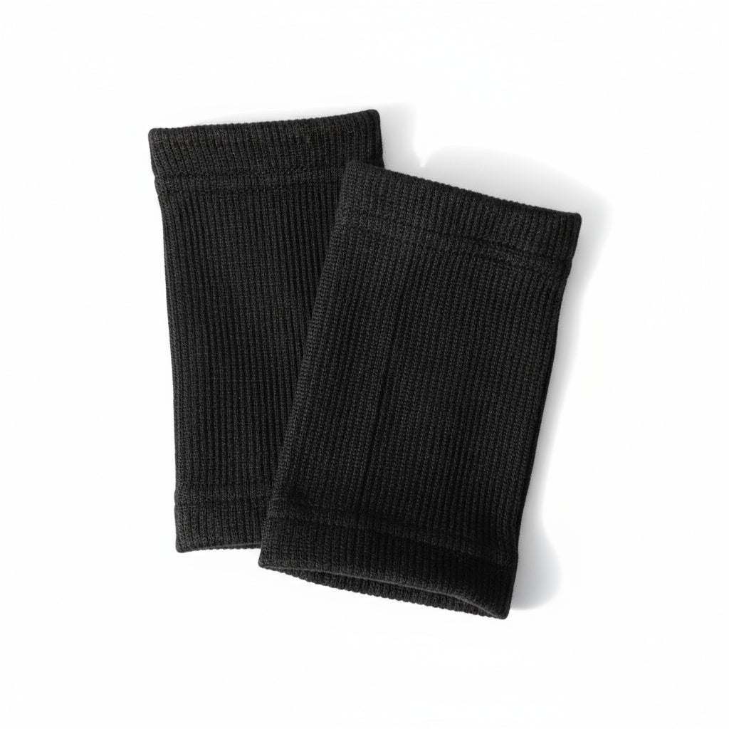 Flat lay of all-black Gorila Death Grips set with cotton wrist bands, premium design for wrist comfort, protection and high performance