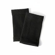 Flat lay of all-black Gorila Death Grips set with cotton wrist bands, premium design for wrist comfort, protection and high performance