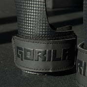 Macro detail of Gorila Death Grips showing sticky rubber surface and textured grip design, optimized for palm protection and pull-up bar adhesion