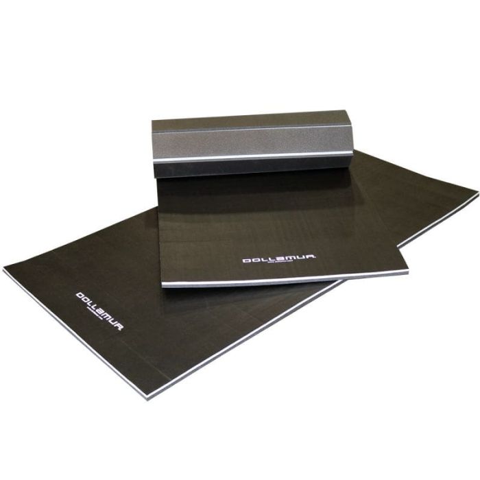 Folded Gorila Fitness Dollamur mats stacked on a white background, showing portable multi-panel design for easy storage and transport.