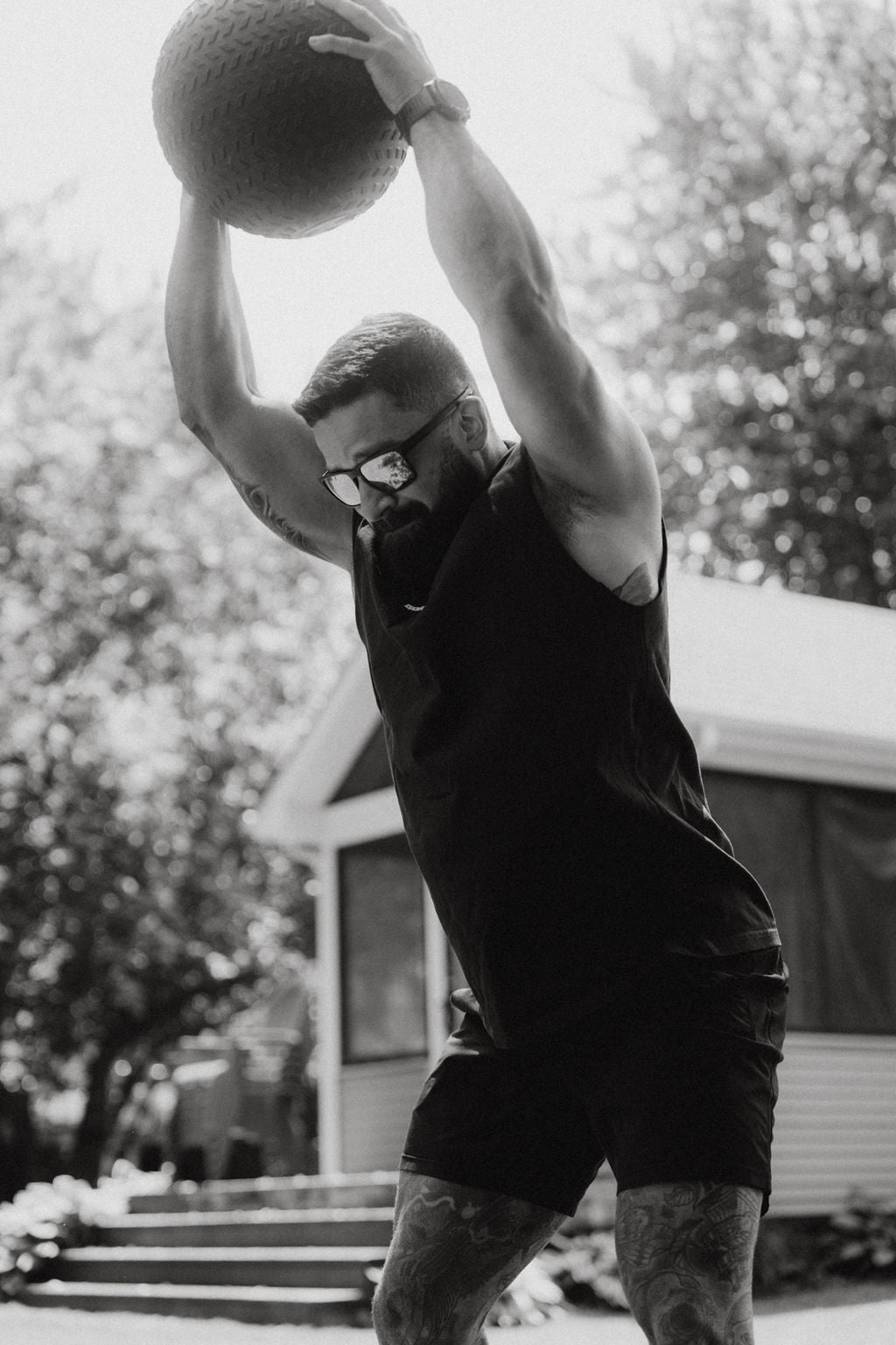 Athlete performing HIIT, powerful overhead slams with the Gorila Fat Slam Ball