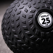 Extreme close-up of the Gorila Fat Slam Ball Tire Grip rubber texture showing raised pattern that improves handling, durability and control in sweaty workouts