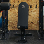 Front view of the Gorila Fitness adjustable incline bench set inside a power rack, heavy-duty steel construction made in Canada for strength training