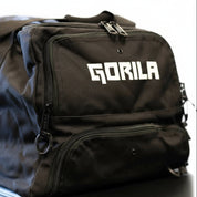 Angled view of the Gorila Gym Bag in black showing structured design and multiple compartments showing Gorila logo in white