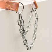 Gorila Leather Dip Belt hanging to show natural leather grain, craftsmanship, and rugged chain connection for gym use.