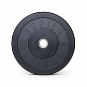 Pair of Gorila Ox 45LB bumper plates on black gym flooring – heavy-duty rubber Olympic weights for powerlifting, CrossFit, and strength training, built for durability and precision with slim profile and dead bounce design