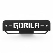 Front view of Gorila Plate Carrier and Rope Storage showcasing the bold Gorila cutout logo and flat mounting plate designed for rigs or direct wall installation.