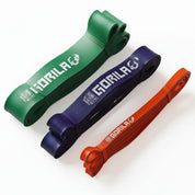 Gorila Band Pack A red purple green set for mobility to medium-heavy pull-up assistance and strength training. Gorila Fitness Branding on white background.