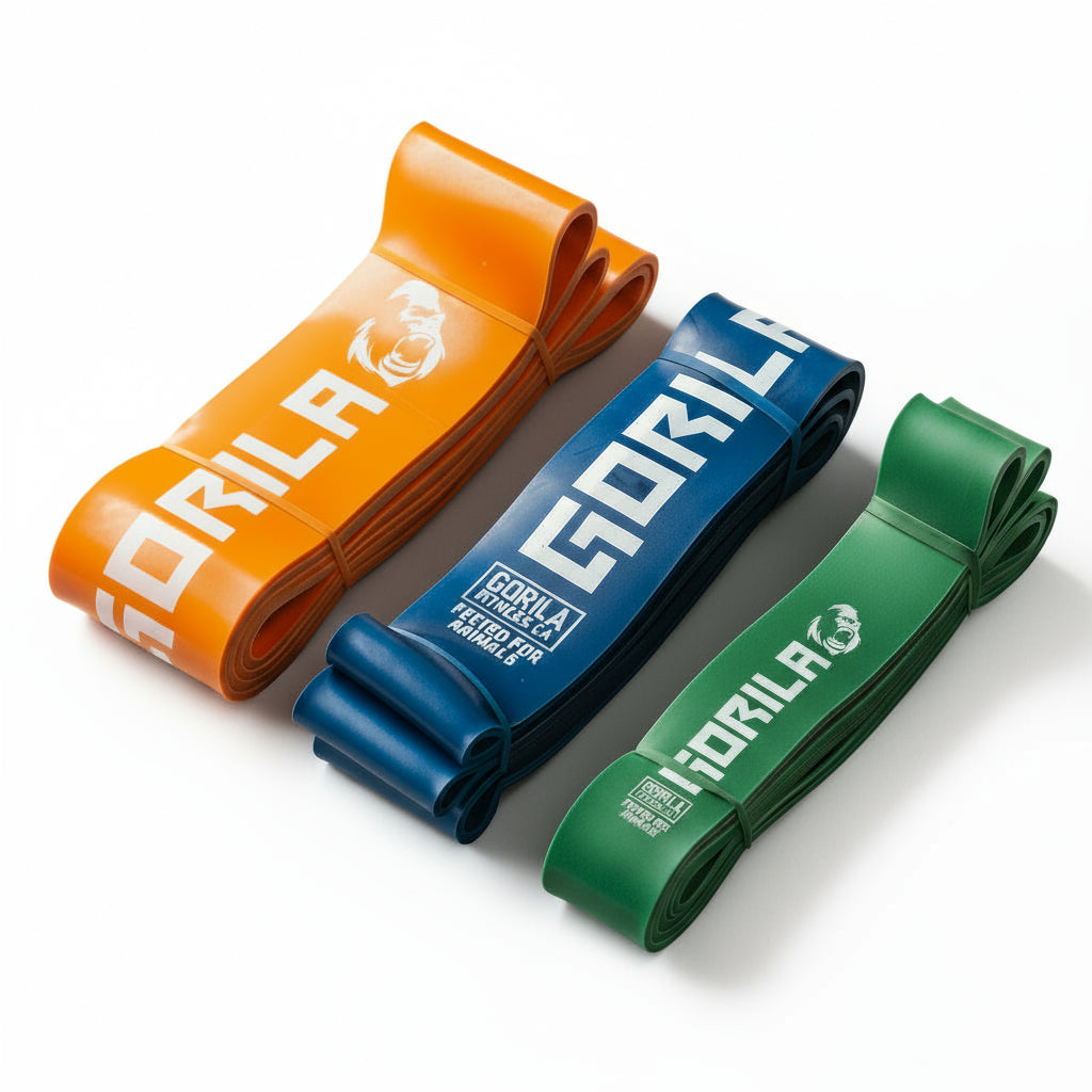 Gorila Band Pack B green blue orange set with thick heavy bands for squats, resisted runs, and stability work. Gorila Fitness Branding on white background.