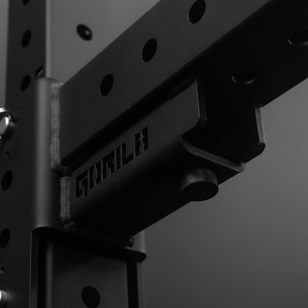 Rubber bumper detail on Gorila Rhino 3.0 Spotter Arms reduces noise and plate slamming impact in home gym or box. Protection for when it's used as a short jammer arms for presses and rows.