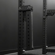 Gorila Rhino 3.0 Spotter Arms mounted on 3x3 power rack, in its folded position ready to be used as short jammer arms, with adjustable height for bench press and squats