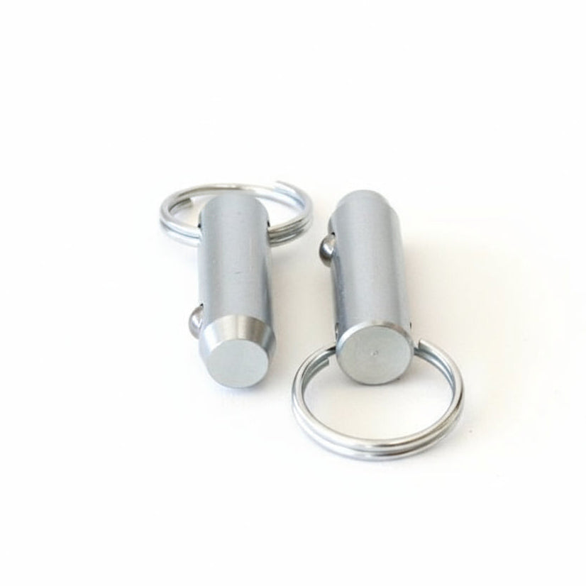 Mounting hardware for Gorila Roller J-Cups, including locking pins and bolts for secure rack installation.