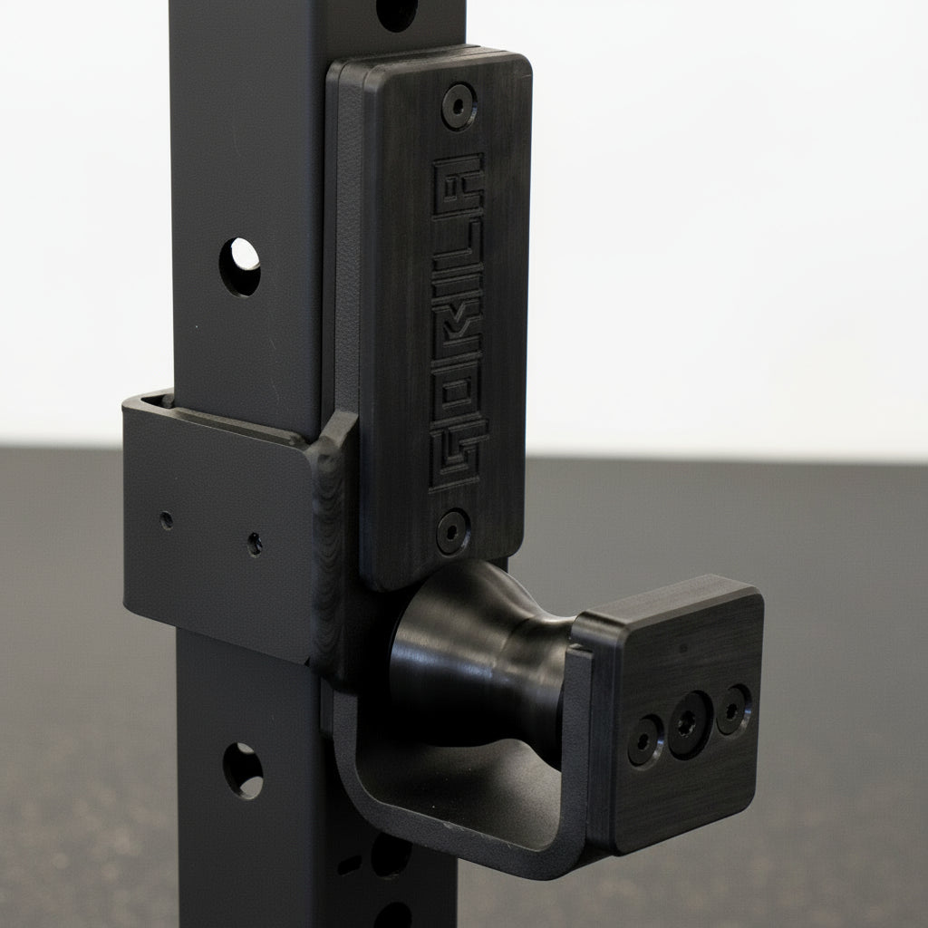Gorila Roller J-Cups mounted on power rack, designed for precise bar alignment and reduced knurl damage.