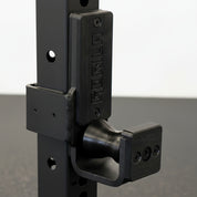 Gorila Roller J-Cups mounted on power rack, designed for precise bar alignment and reduced knurl damage.