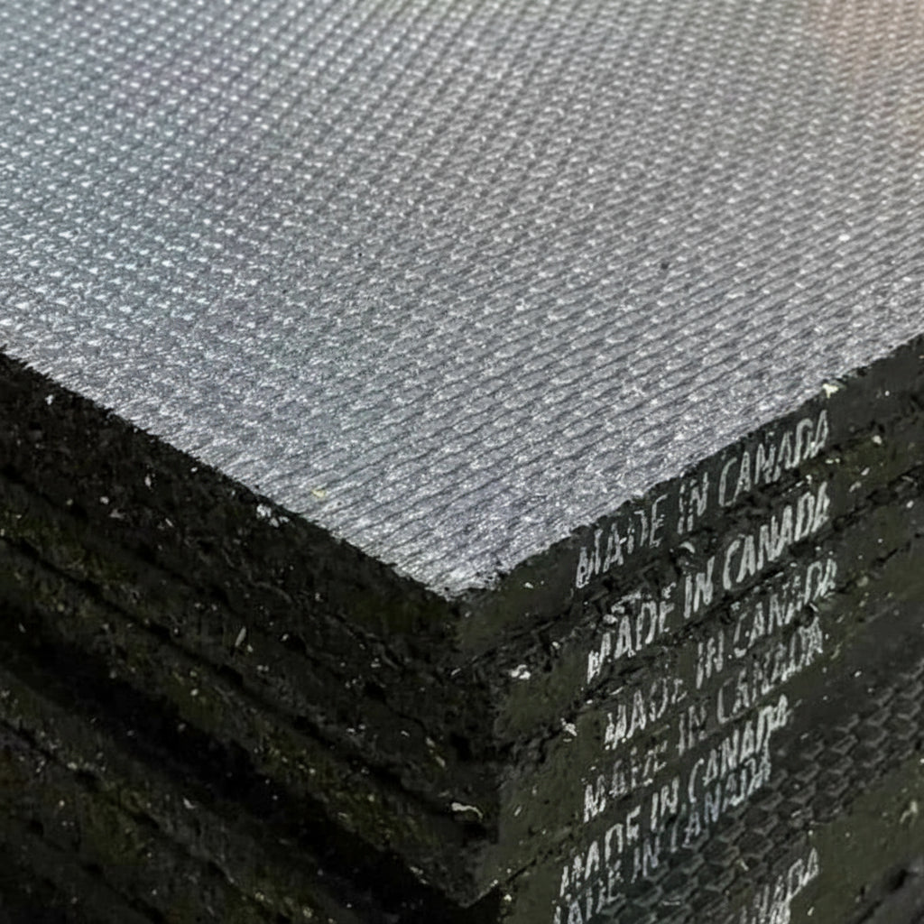 Close-up view of Gorila Rubber Flooring Mat made in Canada from 97% recycled rubber, showing durable non-slip texture for gym and fitness spaces