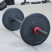 Gorila Strongman Fat Bar loaded with weight plates – short, compact 1.9-inch axle bar for grip strength, strongman, and power training, built for durability and stability.