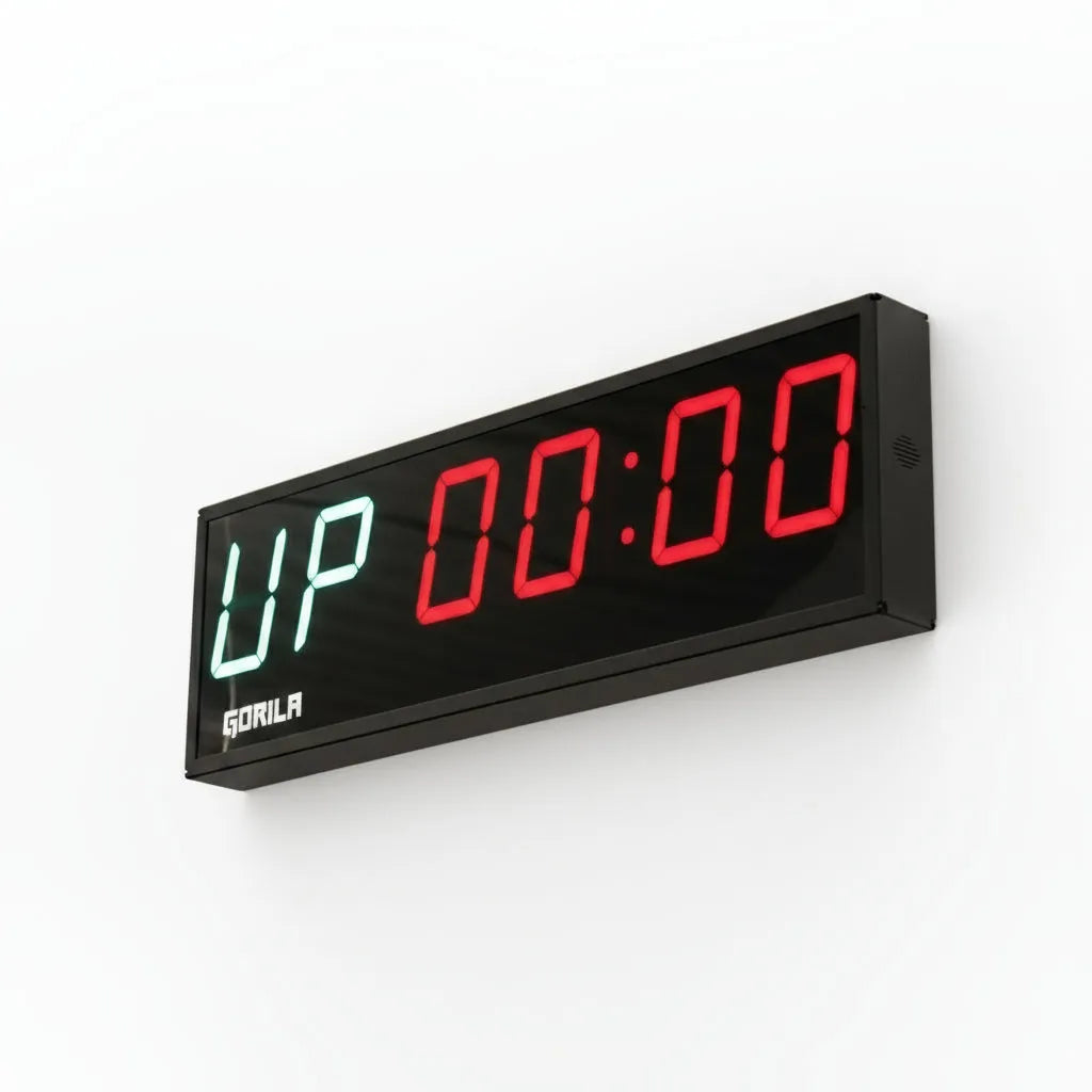 Digital 6-digit timer for commercial gym with 'UP' indicator in green and red display on a white background