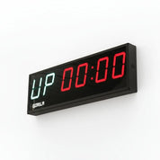 Digital 6-digit timer for commercial gym with 'UP' indicator in green and red display on a white background