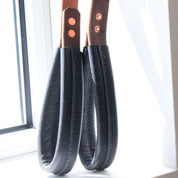 Handmade Gorila leather tricep straps produced in Edmonton, Canada by Northlift Belts, built for durability and premium gym setups.