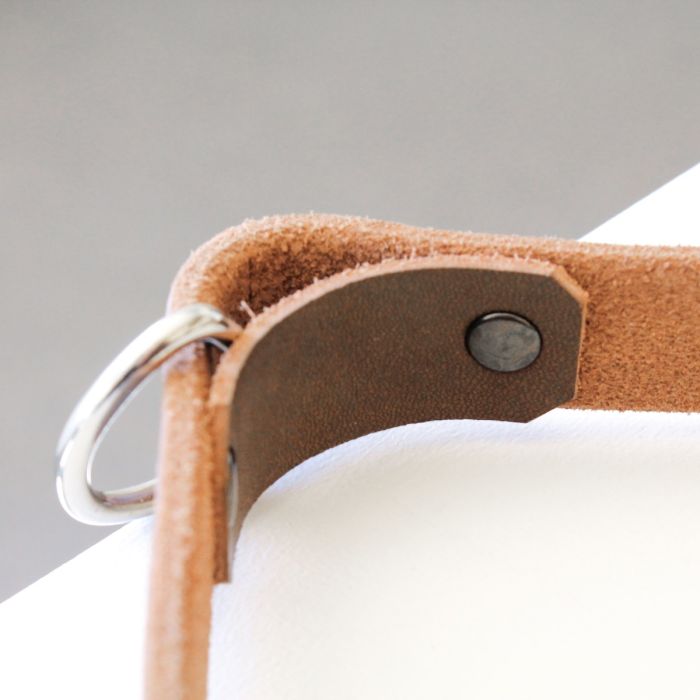 Close-up of Gorila tricep strap showing welded steel D-ring and reinforced stitching for secure attachment and durability.