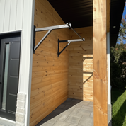 Gorila TRUNK Pull-Up System installed outdoors on wood wall for home gym training