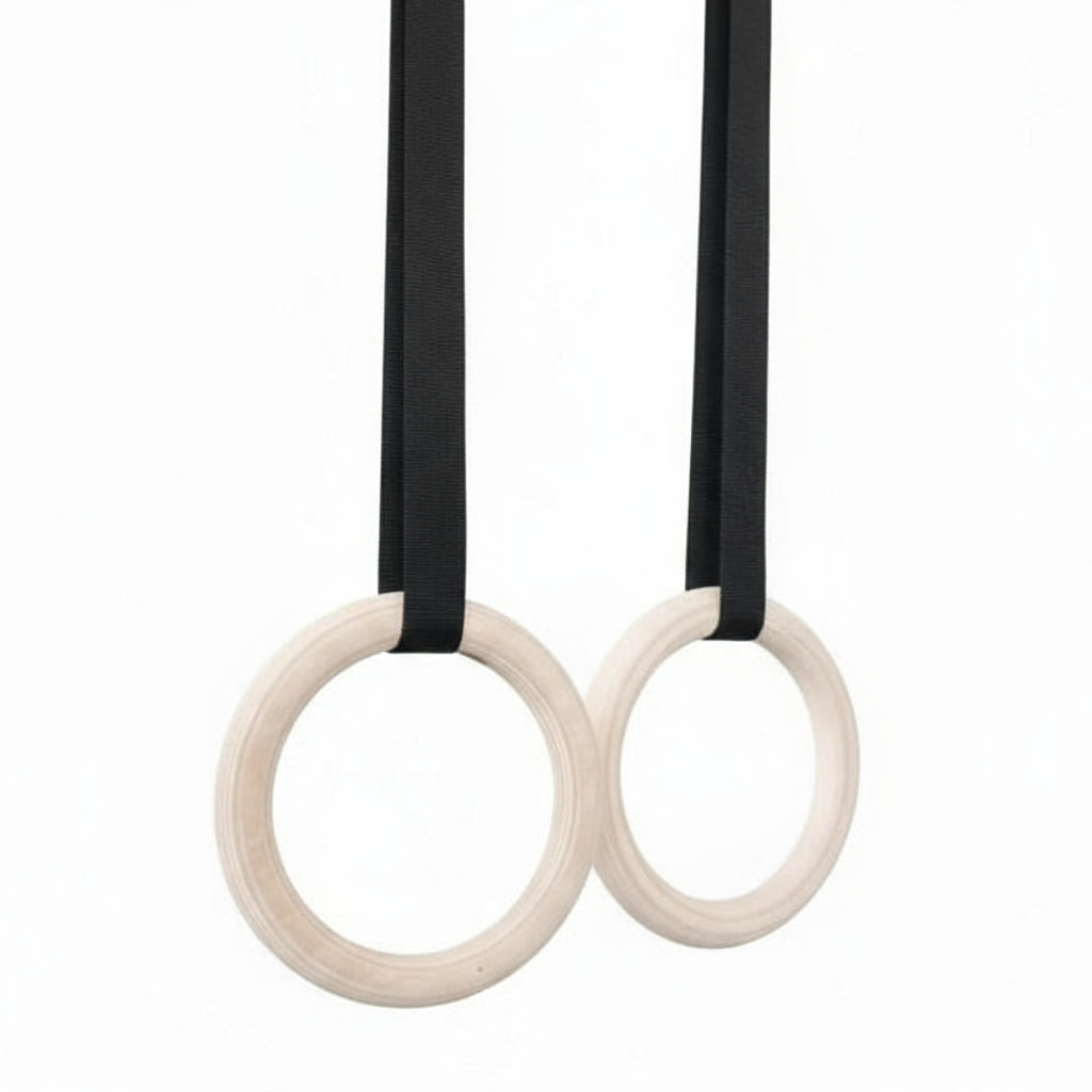 Gorila Wooden Gym Rings set with heavy-duty black straps and metal buckles, ideal for CrossFit-style and functional training workouts.