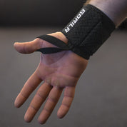 Close view of Gorila logo on wrist wrap and how to wear, male hand and how to correctly put in on.
