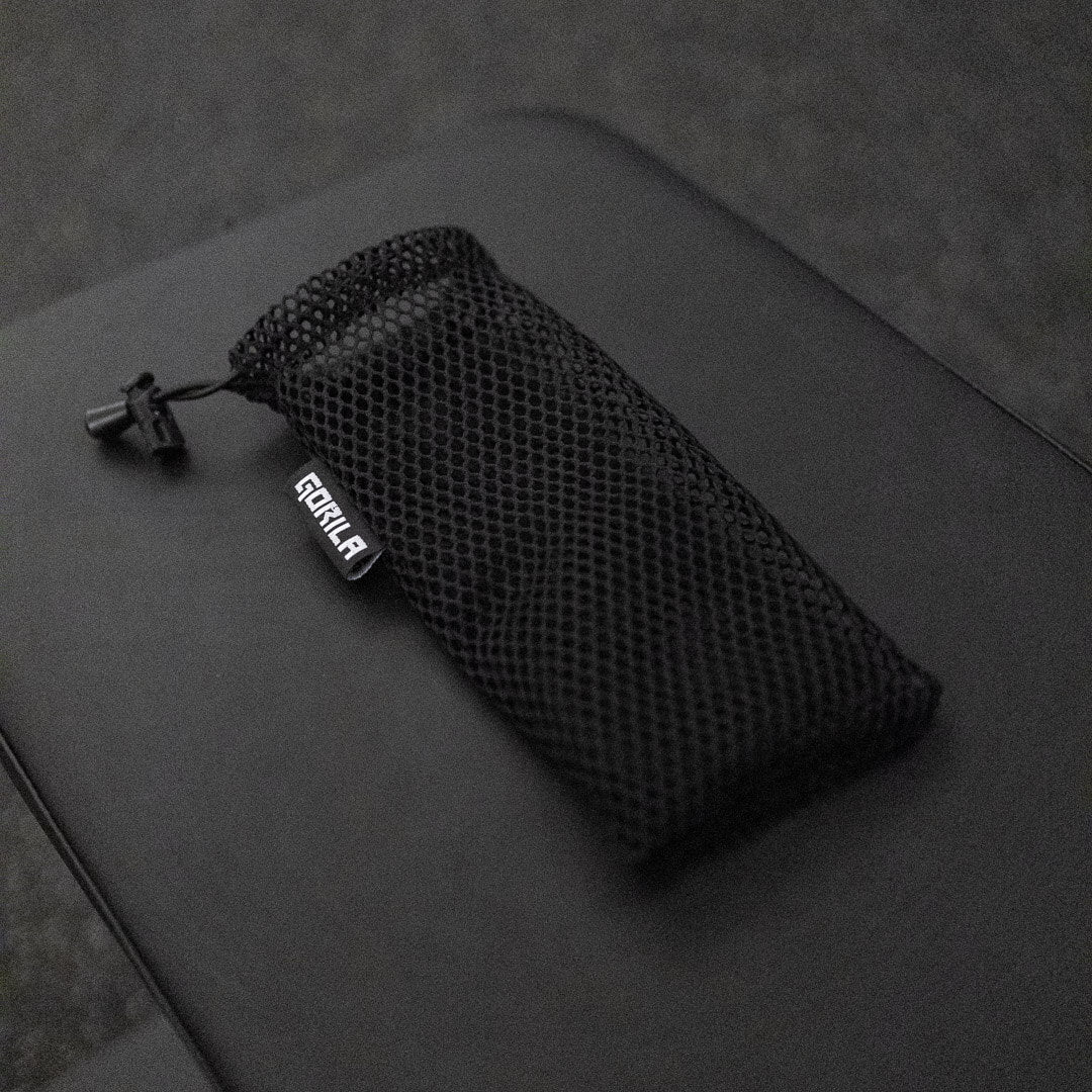 Side angle of Gorila Wrist Wraps showing texture and stitching of the included mesh bag