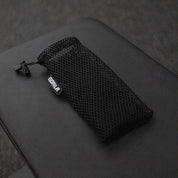 Side angle of Gorila Wrist Wraps showing texture and stitching of the included mesh bag