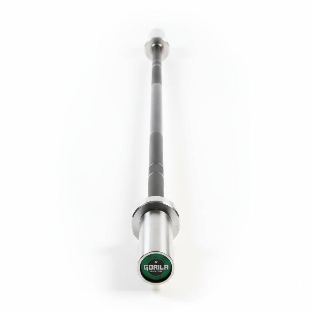 Gorila X Junior Bar – 10kg Olympic training barbell designed for youth and beginner athletes. Features 25mm black oxide shaft, brushed chrome sleeves, and dual knurl marks for Olympic and powerlifting training. Length