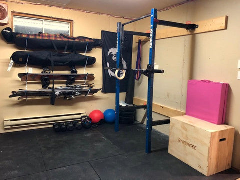 Home gym strength equipment setup in a Canadian house